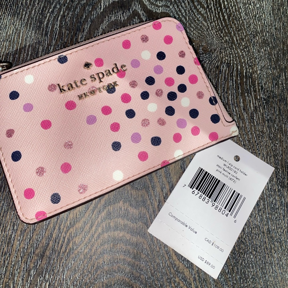 Used like new confetti Kate spade card holder
